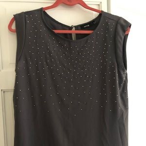 Sleeveless grey blouse. New without tags